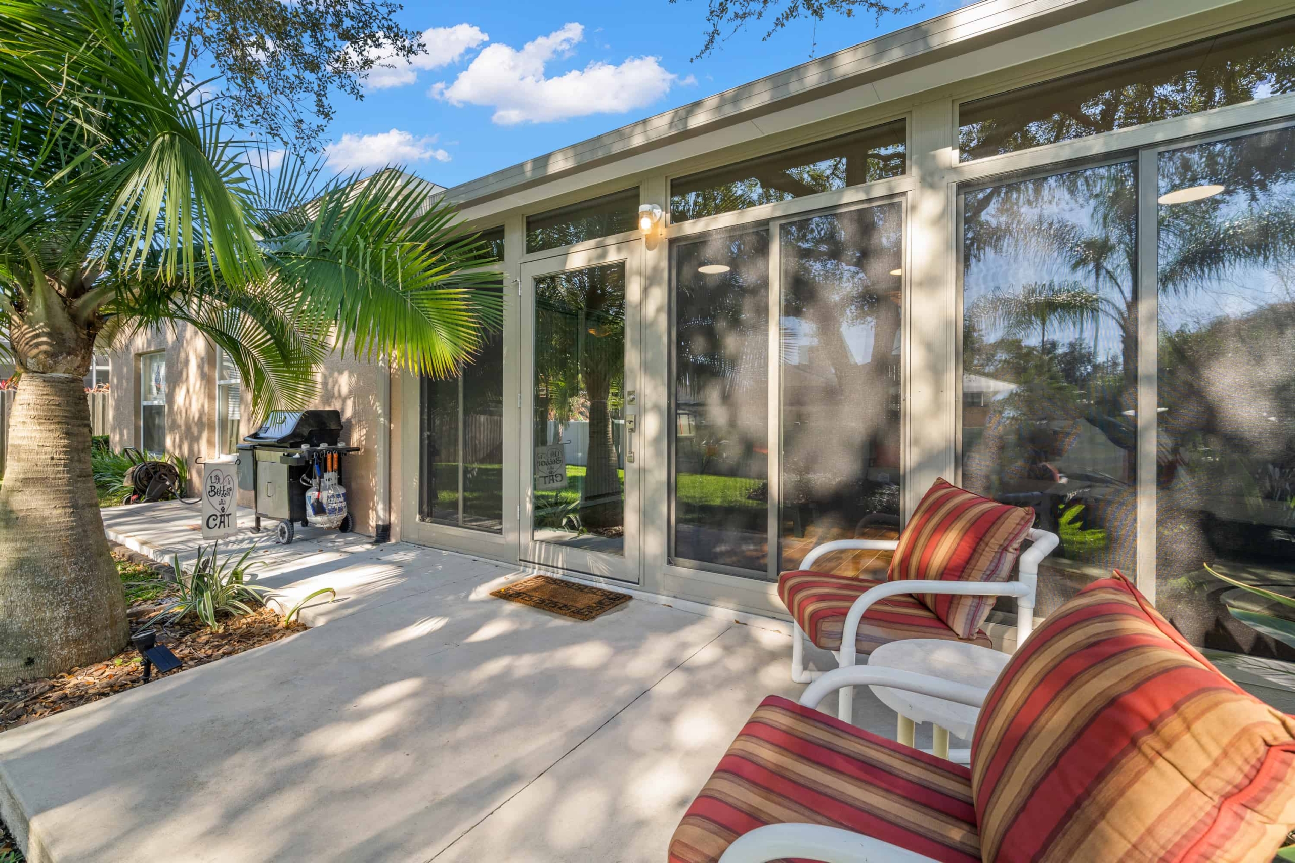 Landscaping for natural cooling of Florida sunroom