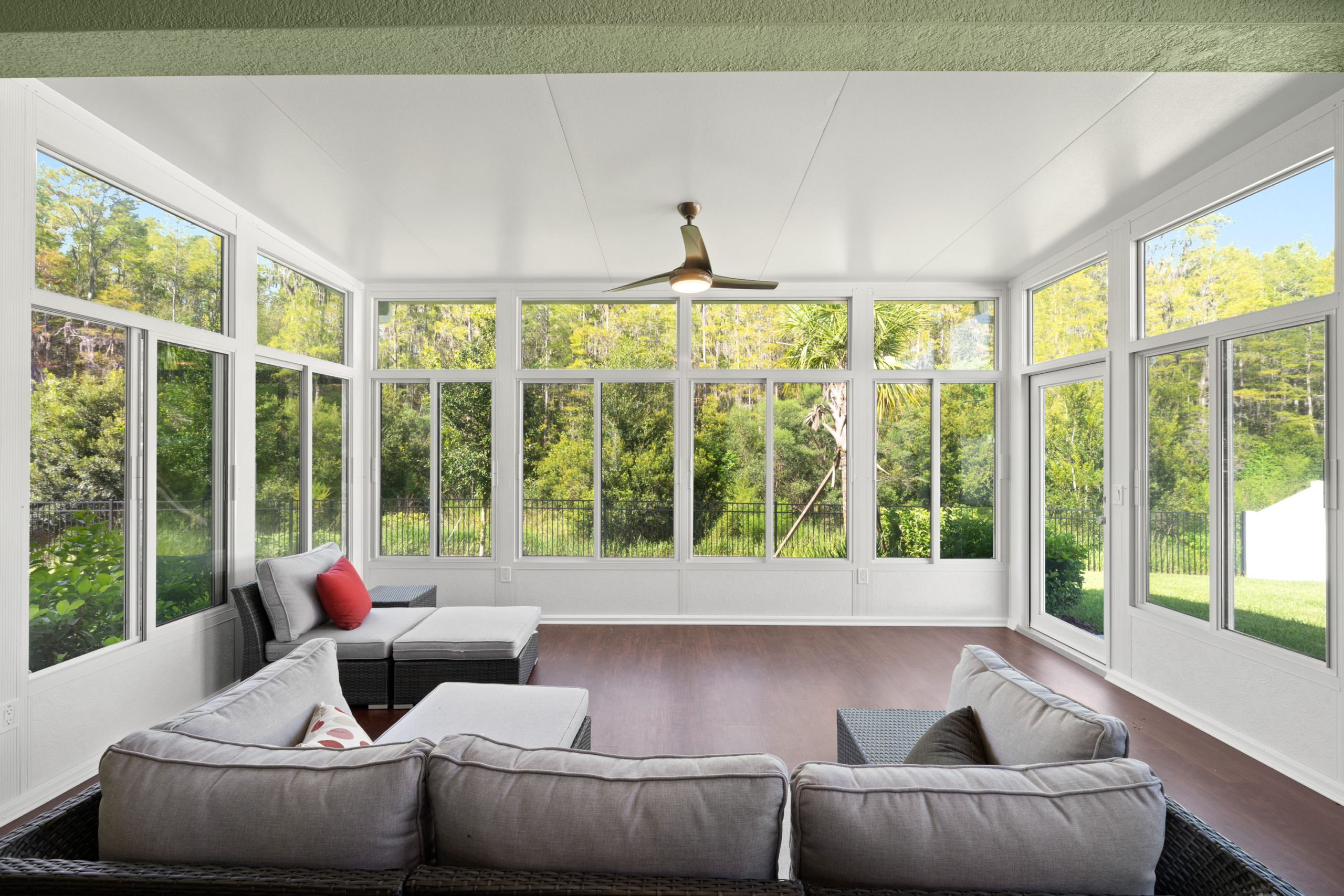 sunroom with backyard view