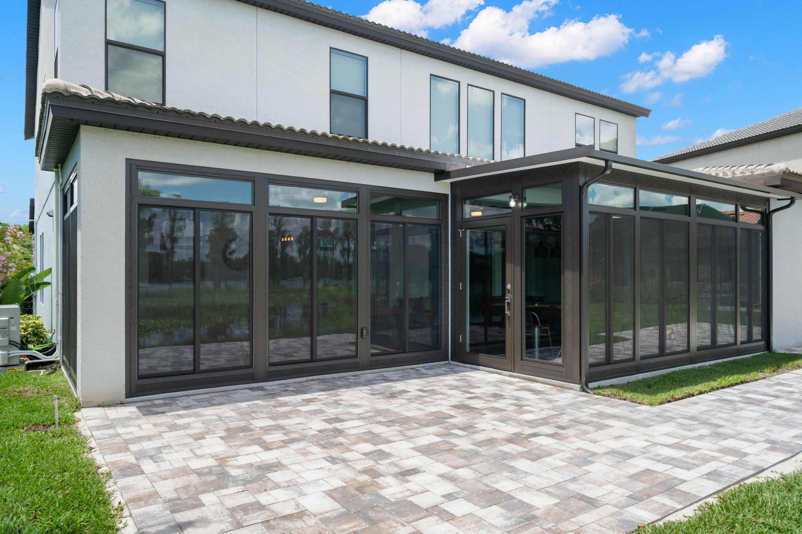 Sunroom with paver patio