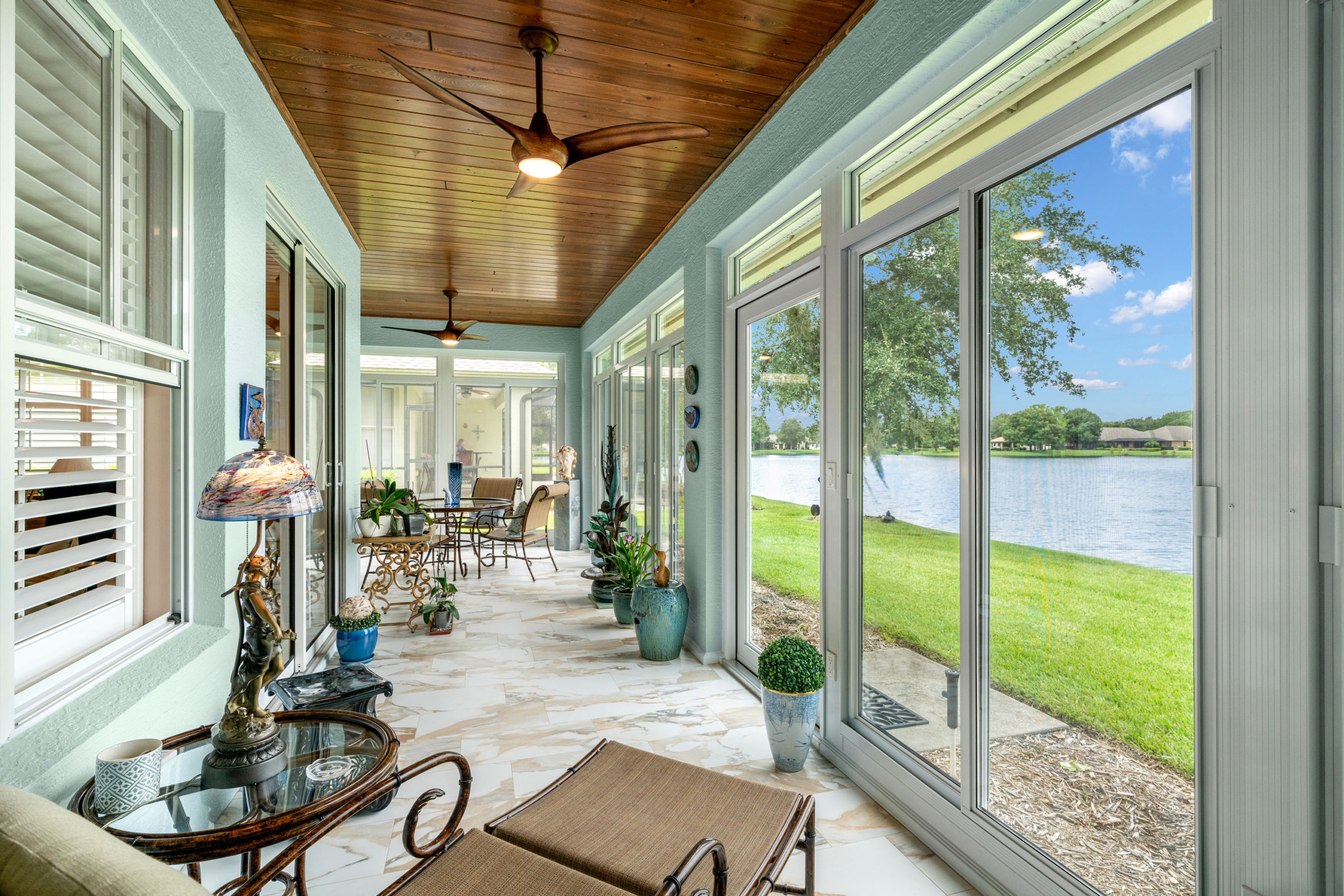 sunroom with wood ceiling